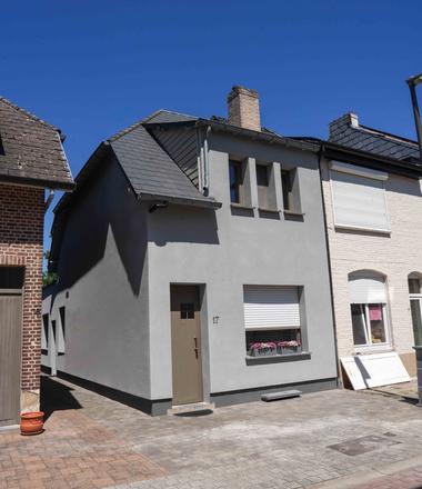 Spuitkurk gevelisolatie in Walem Gevelisolatie met spuitkurk in Walem en blauwe steen
