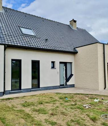 gevelisolatie spuitkurk en steenstrips Merchtem