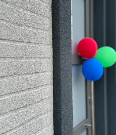 Spuitkurk op baksteen Aalter