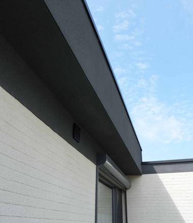 Spuitkurk gevelrenovatie in Hamme Spuitkurk rechtstreeks op de gevel in Hamme als afwerking