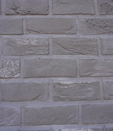 Gevel met isolatie en steenstrips Merksem