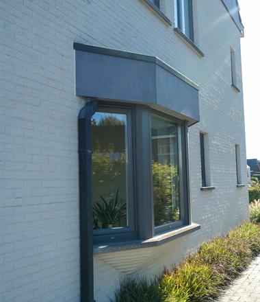 Spuitkurk gevelrenovatie in Sinaai Spuitkurk rechtstreeks op de gevel in Sinaai als afwerking