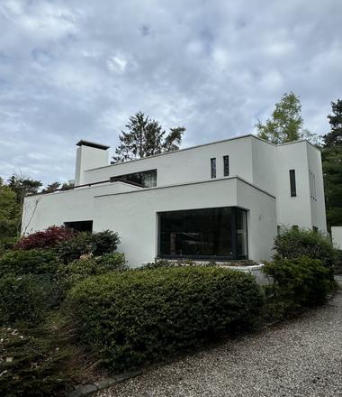 Witte gevel in crepi voor woning in Poppel