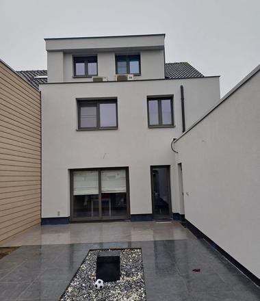 Strakke gevel met crepi in Hamme