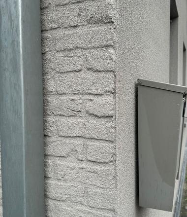 Gevelrenovatie Moerbeke: spuitkurk