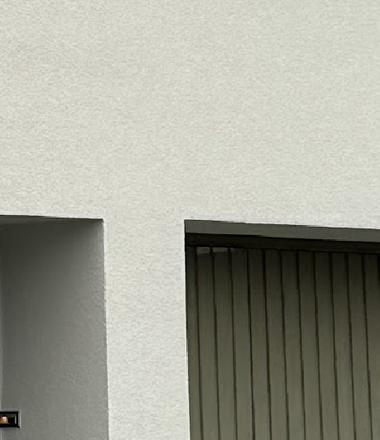 Gevelisolatie en witte crepi in Eeklo