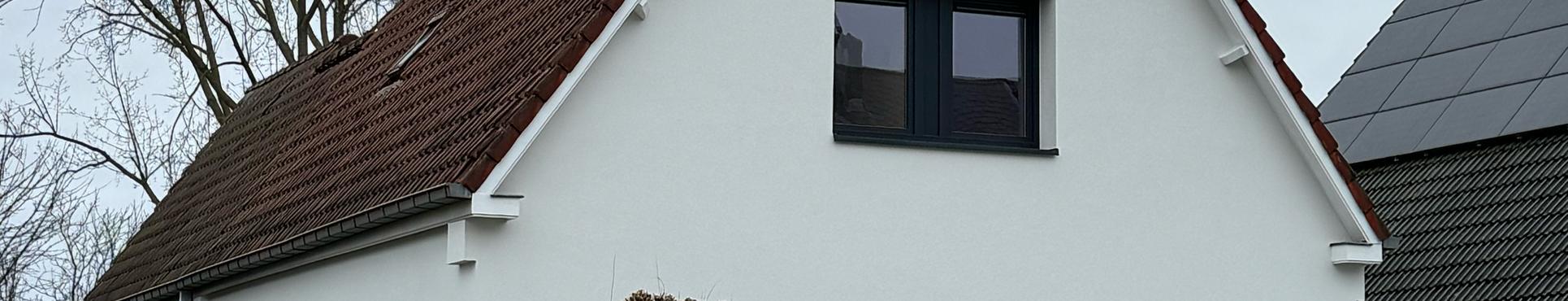 Gevelisolatie en afwerken met crepi + vervangen buitenschrijnwerk in Grimbergen