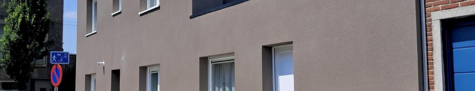 Isolation de façade et finition en liège projeté, isolation de toit et finition toit plat