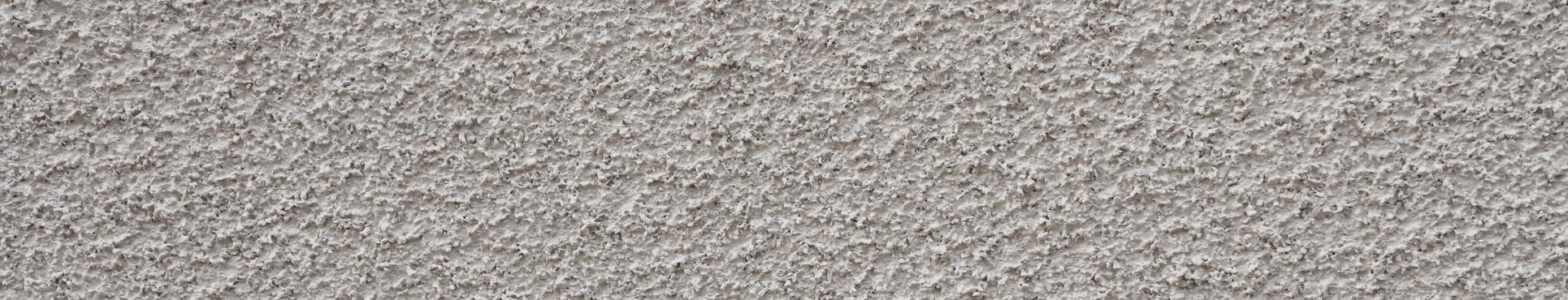 Halfopen woning in Bornem met spuitkurk afgewerkt.