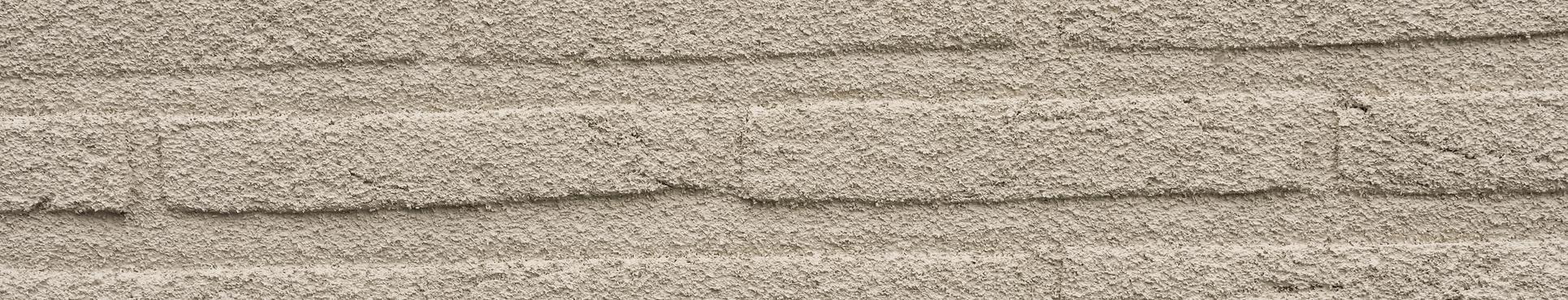 Gevelrenovatie met afwerking in spuitkurk rechtstreeks te Duffel