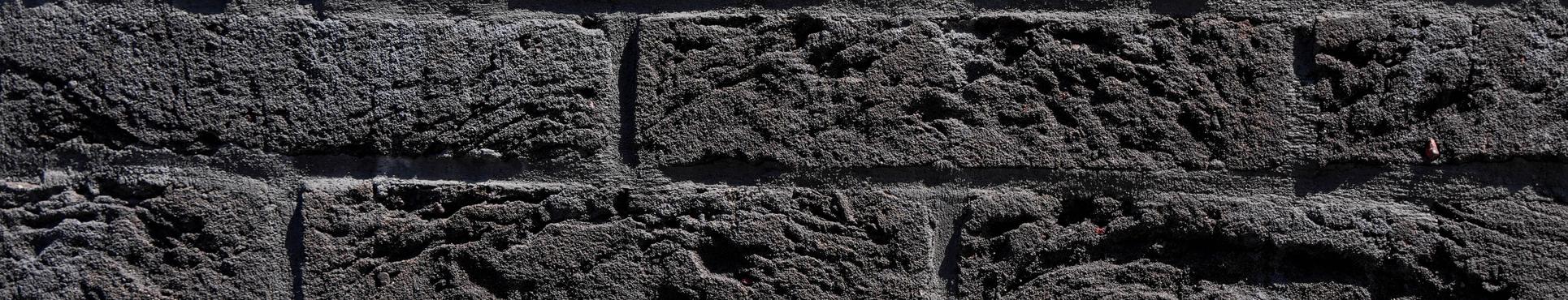 Gevelisolatie en afwerking in steenstrips te Hulst