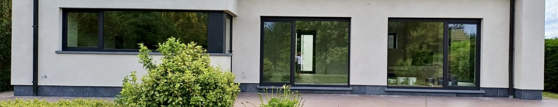 Isolation de façade avec finition en liège projeté et briquettes de parement - Merchtem