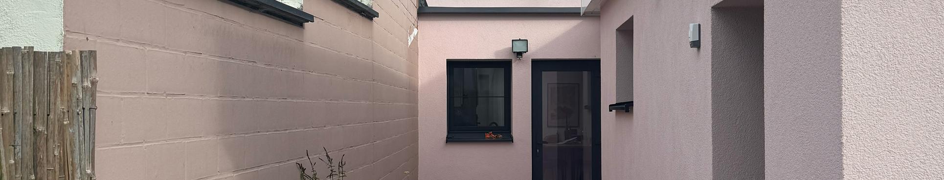 Isolation et finition avec crepi à Merelbeke