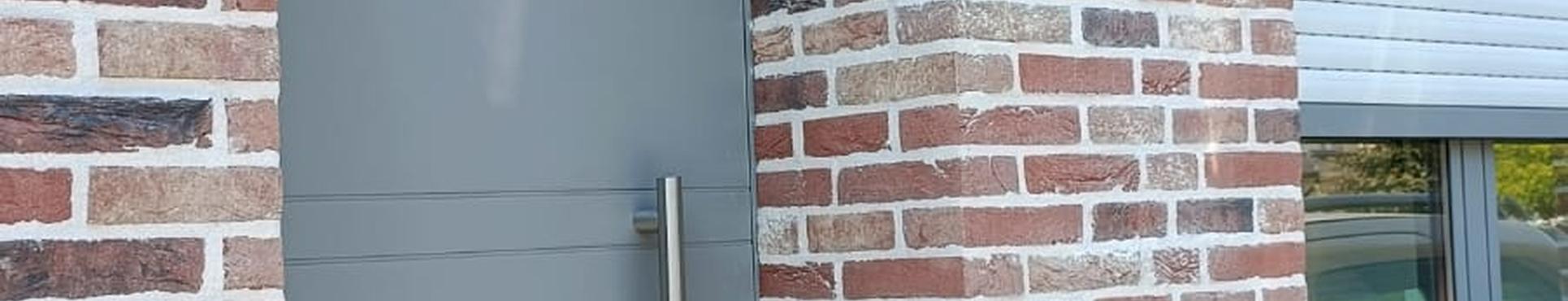 Isolation et finition de façade en plaquettes de brique à Zottegem