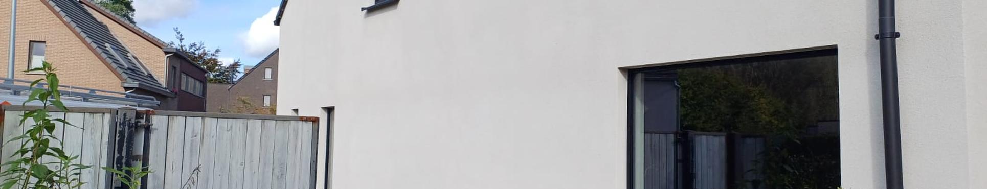 Gevelisolatie en afwerking in spuitkurk te Zemst