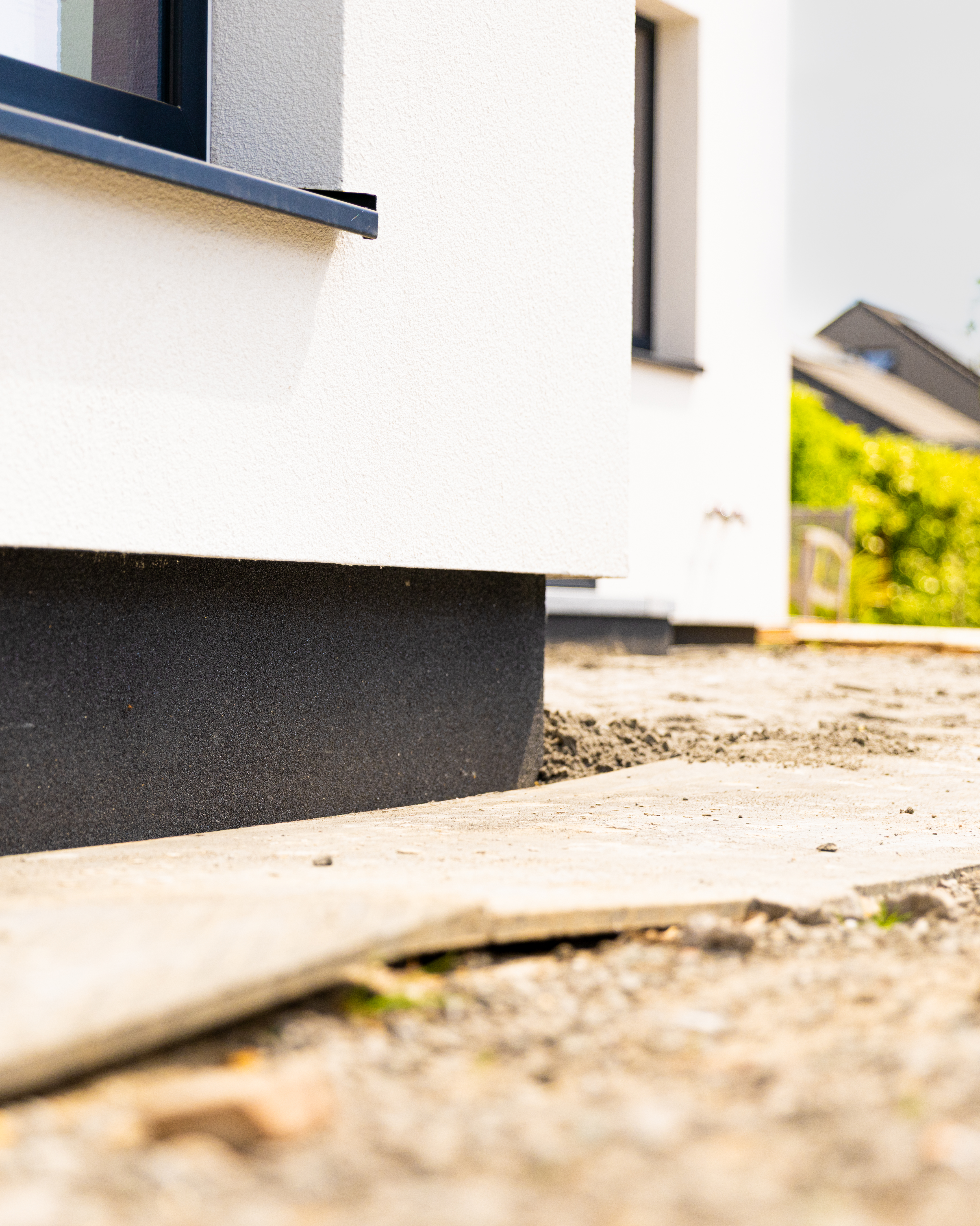 Afwerking in crepi en plint in granulaatkorrel